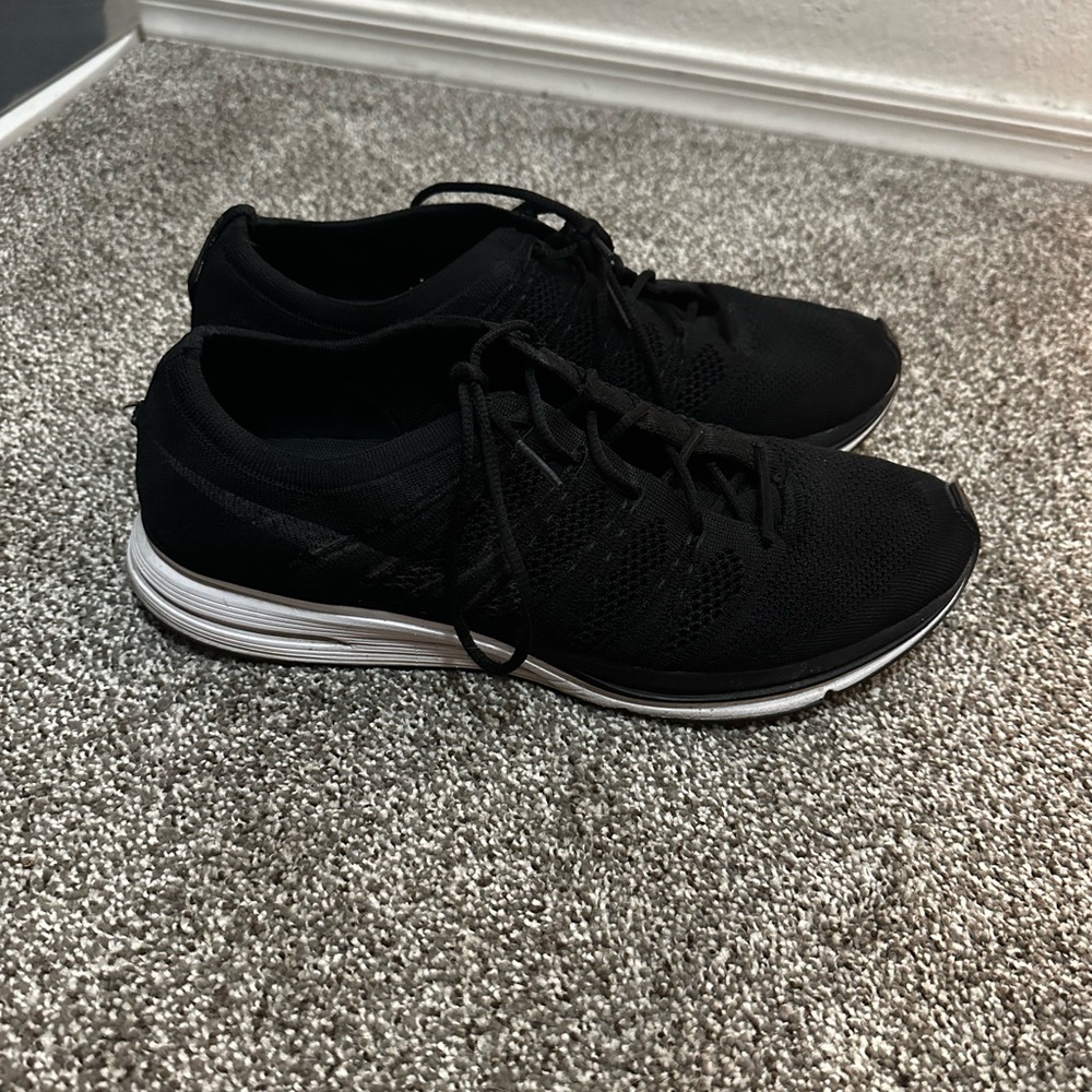 Black Nike fly knit trainers